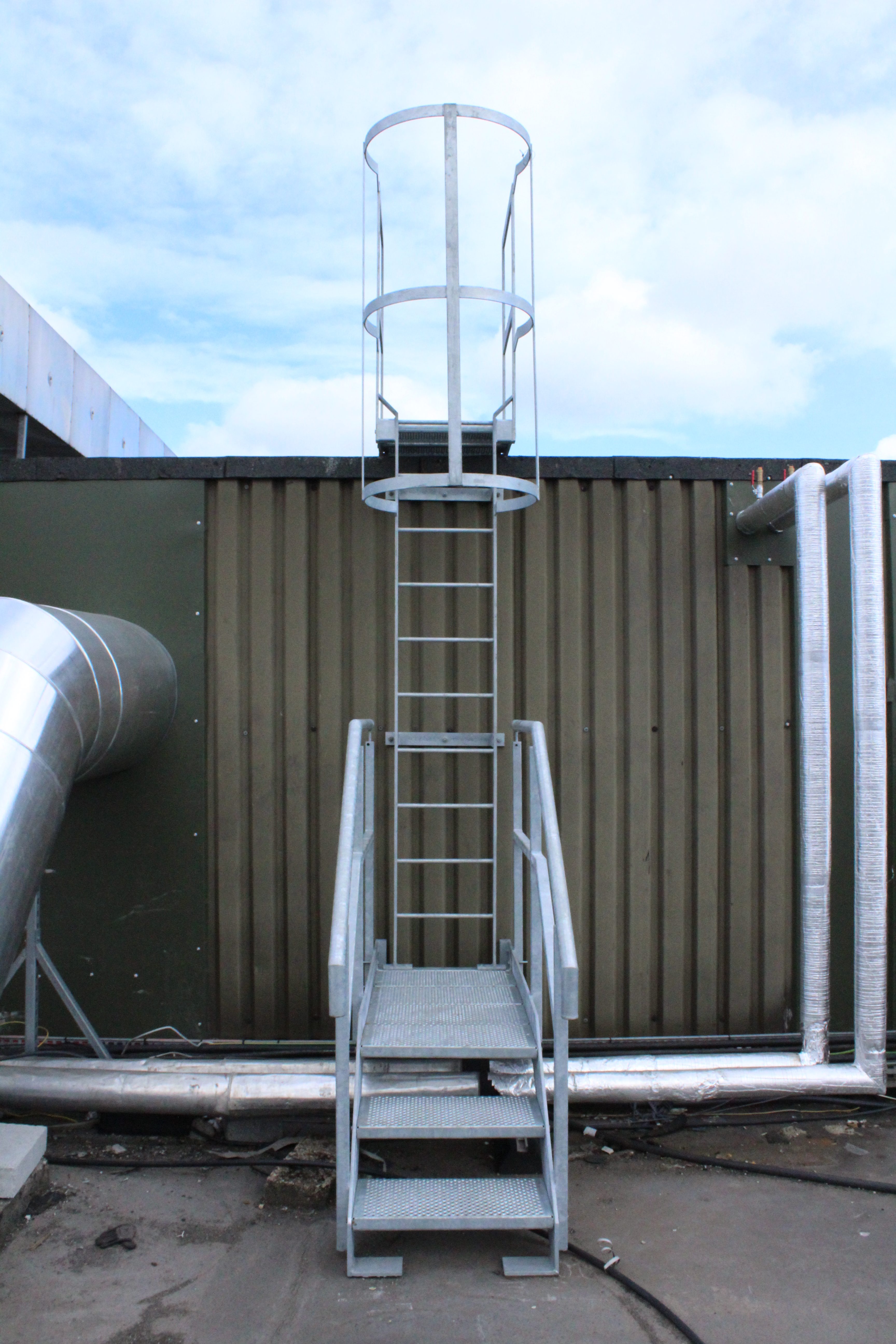 Mild steel galvanised safety ladder with cage and access platform (2